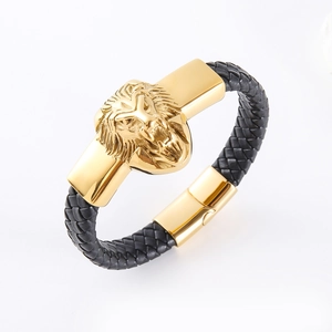 Braided black leather men's bracelet featuring a bold gold lion head and magnetic clasp