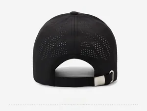 Detail view of the black sports cap back with laser-cut vent holes and metal buckle