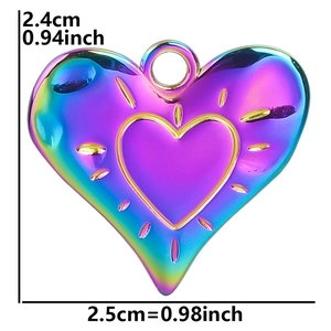 Macro view of a 2.5cm rainbow heart pendant with polished 18k plated stainless steel finish