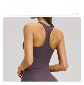 Detail view of the racerback design and elastic fabric on this purple yoga sports top