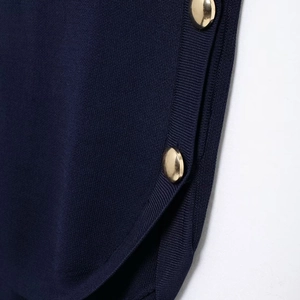 French style navy knit vest with elegant gold button details and curved hemline