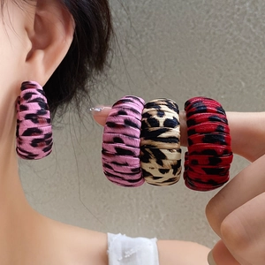 Chic leopard print C-shape hoop earrings in pink, beige and red with leather texture