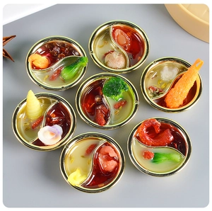Detailed macro view of 7 miniature hot pot models with realistic food ingredients