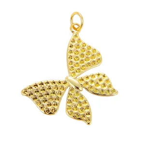Detailed view of butterfly pendant with yellow rhinestones and 32mm measurement guide