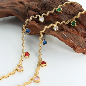 Golden twist chain necklace featuring multi-colored heart-shaped zircon pendants
