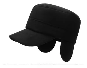 Detail view of winter flat top army hat for men featuring ear flaps and star badge