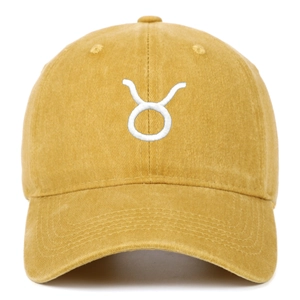 Mustard yellow washed cotton baseball cap with white Taurus constellation embroidery
