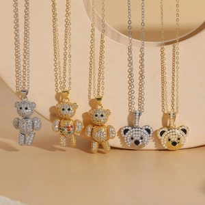Luxurious bear pendant necklaces with zircon crystals and pearls in gold and silver plating