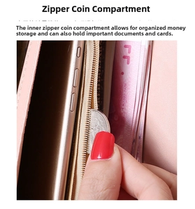 Pink PU leather wallet interior detail with a zipper pocket and a phone compartment slot