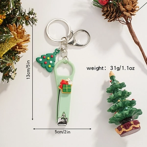 Detail of Christmas Santa nail clipper keychain set with dimensions 13cm by 5cm