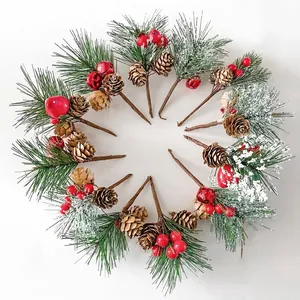 Set of 12 artificial Christmas pine picks with red berries, cones and faux snow