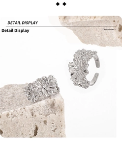 Detailed macro view of S925 sterling silver rings with floral texture and S925 stamp