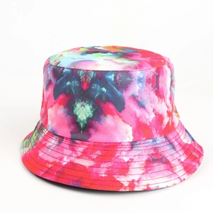 Close-up of vibrant tie-dye patterns and reinforced stitching on a reversible bucket hat
