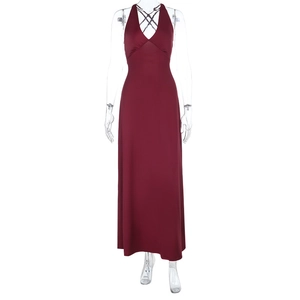Detailed view of backless halter neckline on slim fit burgundy maxi dress