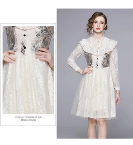 Detailed close-up of intricate lace waist and bodice of French vintage jacquard dress