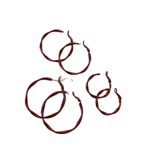 Three sizes of twisted burgundy red geometric metal hoops with vintage matte finish