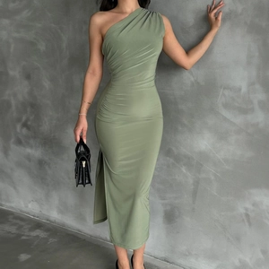Detail of sage green one shoulder dress with slimming ruching and side split
