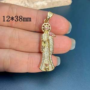 Detailed view of Santa Muerte gold pendant with cubic zirconia, size 12x38mm