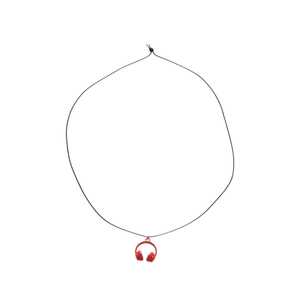 Minimalist necklace featuring a red headphone pendant on a black woven cord strap