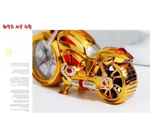 Macro detail of a golden vintage motorcycle clock with a precision white clock face
