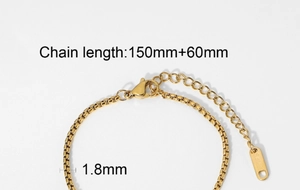 Detail of a 1.8mm gold stainless steel box chain featuring a lobster clasp and S.Steel tag