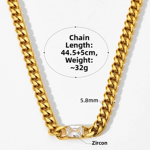 Detail of gold Cuban link chain with emerald-cut zircon and size specifications