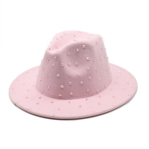 Pink wool felt fedora hat decorated with colorful rhinestones in a stylish jazz design