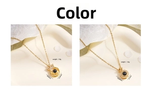 Detail of two gold crown projection necklaces showing precise dimensions and weights