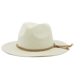 Detailed close-up of woven paper straw Panama hat with a decorative brown cord band