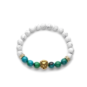 Beaded bracelet featuring a golden lion head, white marble stones, and tiger eye beads