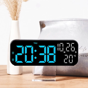 9-inch LED digital alarm clock with mirror display, temperature, and date on wooden desk