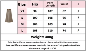Size chart for satin wide-leg pants showing waist, hip, and length measurements from XS to L