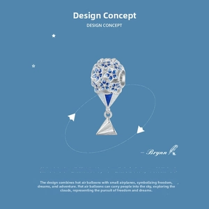 Detail of 925 sterling silver hot air balloon charm with blue enamel flowers and paper plane