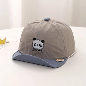Detailed view of baby cap featuring panda embroidery and breathable grey fabric