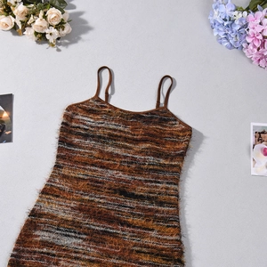 Detailed flat lay of a fuzzy knit maxi dress featuring brown striped furry texture