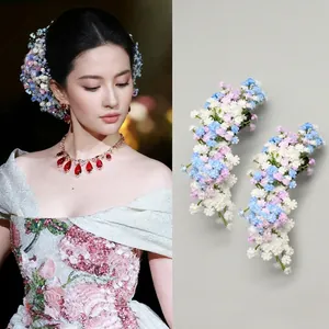 Elegant floral cluster hair clips with colorful gypsophila petals for a romantic hairstyle