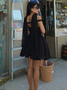 Chic black V-neck backless mini dress with elegant flowing ribbons for summer wear