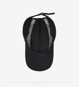 Detail view of the breathable black mesh interior lining and adjustable strap on the cap