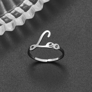 Silver Leo zodiac sign open ring in 18K stainless steel with elegant cursive design