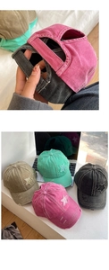Close-up of adjustable strap and color variety of distressed star baseball caps
