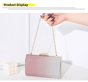 Detail of pink to silver gradient sequin evening clutch bag with gold chain strap