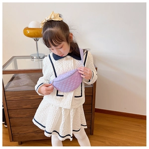Detail of lavender quilted cross body chest bag for kids with adjustable strap