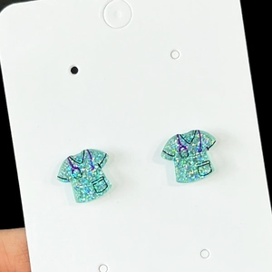 Glittery medical scrub earrings for nurses in turquoise with stethoscope pattern