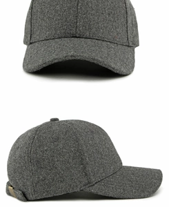 Detail of wool blend baseball cap showing thick gray fabric texture and metal buckle
