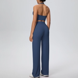 Detail view of the deep blue sports set showing the back cut and matte fabric texture