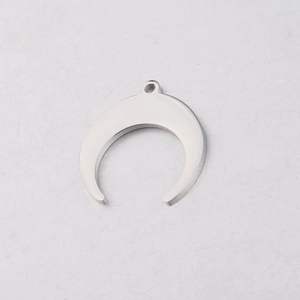 Detailed view of flat silver crescent moon pendant in polished stainless steel for DIY jewelry