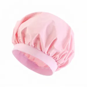Pink waterproof shower cap with a wide elastic headband and glossy satin finish