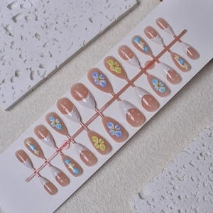 24pcs nude almond press-on nails with 3D floral carving and French tips glossy finish