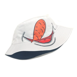 Detail of white bucket hat with cartoon mouth print and dark blue inner lining