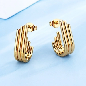 Retro Edelstahl Ohrringe in Gold mit unregelmäßigem dreifach-linearem Geometriedesign
